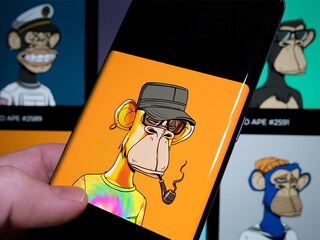 A man walks past a mural depicting RM, a member of K-pop group BTS, in Goyang, northwest of Seoul, on June 15, 2022. (Photo by Anthony WALLACE / AFP)