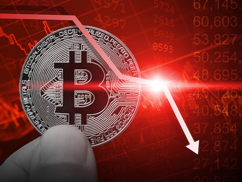 Environmental activists, wearing masks mimicking EU leaders, EU Commission President Ursula von der Leyen and France"s President Emmanuel Macron,   protest to call on EU leaders to exit the Energy Charter Treaty (ECT) near the European headquarters in Brussels in May, 2022. Image: Kenzo TRIBOUILLARD / AFP)