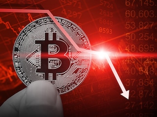 Environmental activists, wearing masks mimicking EU leaders, EU Commission President Ursula von der Leyen and France"s President Emmanuel Macron, protest to call on EU leaders to exit the Energy Charter Treaty (ECT) near the European headquarters in Brussels in May, 2022. Image: Kenzo TRIBOUILLARD / AFP)