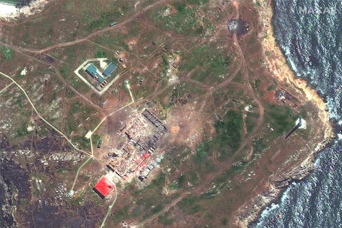 A satellite image shows destroyed buildings, probable Pantsir air defense vehicles and a destroyed helicopter in Snake Island, Ukraine May, 2022. Satellite image 2022 Maxar Technologies/Handout via REUTERS
