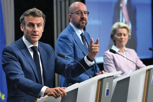 France"s President Emmanuel Macron (L), President of the European Council Charles Michel (C) and President of the European Commission Ursula von der Leyen (R) attend a press conference during an European Council in Brussels on June 23, 2022. Image: JOHN THYS / AFP