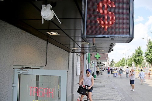 A woman pictured by a U.S. dollar sign at the entrance to the exchange office on June 27, 2022, in Moscow, Russia. Russia has defaulted on its foreign debt for the first time in over a century, after a grace period on missed interest payments expired on Sunday. Image: Contributor/Getty Images A woman pictured by a U.S. dollar sign at the entrance to the exchange office on June 27, 2022, in Moscow, Russia. Russia has defaulted on its foreign debt for the first time in over a century, after a grace period on missed interest payments expired on Sunday. Image: Contributor/Getty Images