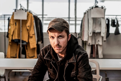 Glenn Martens in the Diesel studio in Milan, Italy, Feb. 18, 2022. The onetime rock ’n’ roll jeans brand is now designed by Martens. Image: Alessandro Grassani/The New York Times