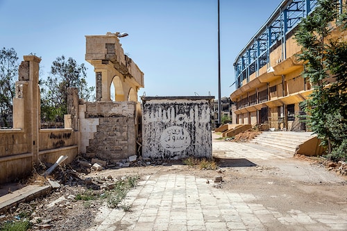A faded flag of the Islamic State in Raqqa, Syria, June 12, 2018. The Islamic State on Tuesday, March 10, 2022, announced that it has a new leader, but provided little information on the true identity or background of the man who will now oversee the global terrorist organization.

Image: Ivor Prickett/The New York Times
