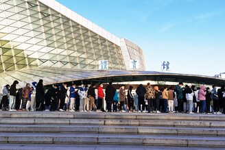 Residents line up to get tested for Covid-19 outside a gym in Changchun in Northeast China"s Jilin province on March 11, 2022. China locked down Changchun, a city of nine million residents amid a new spike in Covid-19 cases, China"s biggest Covid surge in two years.
