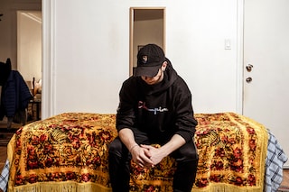 Ivan Danyliuk, a waiter at Veselka, the popular Ukrainian restaurant in Manhattan, at his home in Queens on Tuesday, March 8, 2022. Danyliuk is among a growing number of Ukrainians in New York and across the country, many of whom have never fired a weapon, who are heeding Ukrainian President Volodymyr Zelensky’s call to join the front line against Russia. (Sasha Maslov/The New York Times)