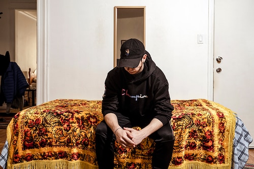 Ivan Danyliuk, a waiter at Veselka, the popular Ukrainian restaurant in Manhattan, at his home in Queens on Tuesday, March 8, 2022. Danyliuk is among a growing number of Ukrainians in New York and across the country, many of whom have never fired a weapon, who are heeding Ukrainian President Volodymyr Zelensky’s call to join the front line against Russia. (Sasha Maslov/The New York Times)