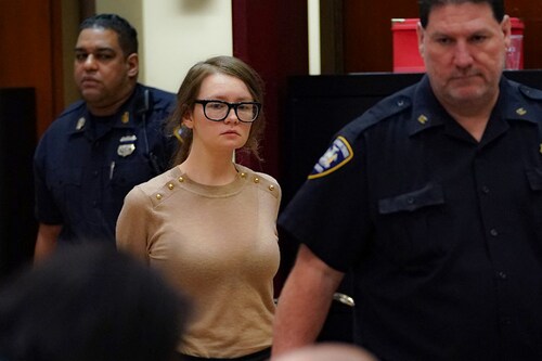 Anna Sorokin better known as Anna Delvey, the 28-year-old German national, whose family moved there in 2007 from Russia, is seen in the courtroom during her trial at New York State Supreme Court in New York on April 11, 2019. - The self-styled German ìheiressî has been charged with grand larceny and theft of services charges alleging she swindled various people and businesses. (Photo by TIMOTHY A. CLARY / AFP) Anna Sorokin better known as Anna Delvey, the 28-year-old German national, whose family moved there in 2007 from Russia, is seen in the courtroom during her trial at New York State Supreme Court in New York on April 11, 2019. - The self-styled German ìheiressî has been charged with grand larceny and theft of services charges alleging she swindled various people and businesses. (Photo by TIMOTHY A. CLARY / AFP)