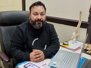 Cindy Armstrong is pictured with a bag containing the composted remains of her son Andrew Armstrong at her home in Covington, Washington on March 15, 2022. Armstrong recalled her son Andrew insisting on the so-called "terramation" process after the western state of Washington in 2019 became the first in the United States to make it a legal alternative to cremation. (Credit: Jason Redmond / AFP)