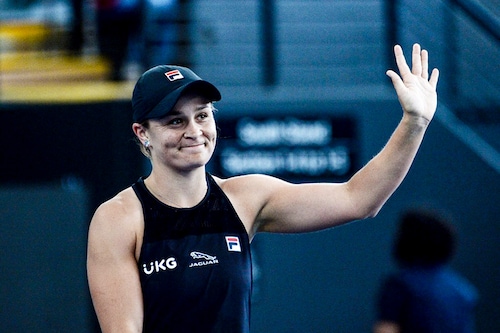 This file photo taken on January 7, 2022 shows Australian Ashleigh Barty celebrating after defeating Sofia Kenin of the US at the Adelaide International WTA women"s singles tennis tournament in Adelaide. - Australian world number one Ashleigh Barty shocked the tennis world by announcing her retirement from the sport on March 23, 2022 at the age of just 25. (Photo by Brenton Edwards/ AFP)