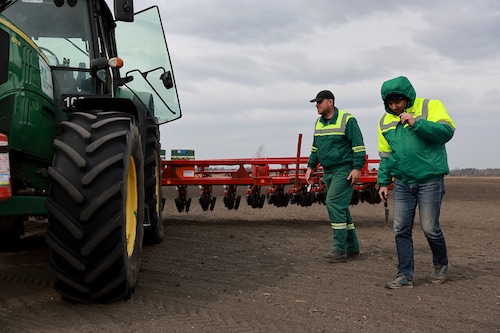 Morda Vasyl (L) and Holovanych Andrii work on planting sugar beet seeds in the field on March 26, 2022 in Humnyska, Ukraine. With more than 150,000 square miles of agricultural land, Ukraine has been called the "breadbasket" of Europe, and is a major exporter of wheat, barley, sugar beets and other grains and sunflower oil. (Credit: Joe Raedle/Getty Images) Morda Vasyl (L) and Holovanych Andrii work on planting sugar beet seeds in the field on March 26, 2022 in Humnyska, Ukraine. With more than 150,000 square miles of agricultural land, Ukraine has been called the "breadbasket" of Europe, and is a major exporter of wheat, barley, sugar beets and other grains and sunflower oil. (Credit: Joe Raedle/Getty Images)