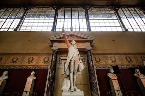 A photograph taken on March 2, 2022 shows the statue ofFrench astronomer, mathematician, freemason, and political leader Jean Sylvain Bailly at the Jeu de Paume hall in Versailles, near Paris. After 8 months of restoration work, the Jeu de Paume room in Versailles, emblematic place of the Revolution in France and symbol of the birth of democracy, is about to reopen its doors to public on April 1, 2022. (Credit:&nbspSameer Al-DOUMY / AFP)