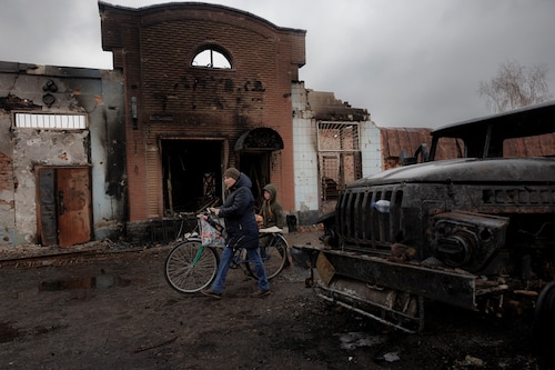A resident walks past a burned out building after Ukrainian forces expelled Moscow"s troops from the the town of Trostyanets which they had occupied at the beginning of their war with Ukraine, March 30, 2022. (Credit: Thomas Peter / Reuters) A resident walks past a burned out building after Ukrainian forces expelled Moscow"s troops from the the town of Trostyanets which they had occupied at the beginning of their war with Ukraine, March 30, 2022. (Credit: Thomas Peter / Reuters)