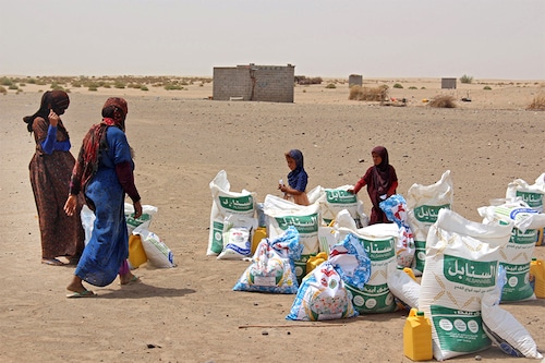 Yemeni families receive flour rations and other basic food supplies from charitiesin the province of Lahj, in southern Yemen, as food prices have doubled since last year and the fact that Ukraine supplies nearly a third of Yemen"s wheat imports has heightened fears of a deepening famine. The disruption in export flows resulting from Russia"s invasion and international sanctions has spurred fears of a global hunger crisis. (Credit: Saleh Al-OBEIDI / AFP)