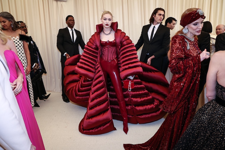 Supermodel Gigi Hadid arrives at The 2022 Met Gala Celebrating "In America: An Anthology of Fashion" at The Metropolitan Museum of Art on May 02, 2022, in New York City. Hadid wore a custom made Versace corset with a sprawling puffer coat that reminded the fashion police of the Thom Browne creation rapper Cardi B wore at the 2019 Met Gala.