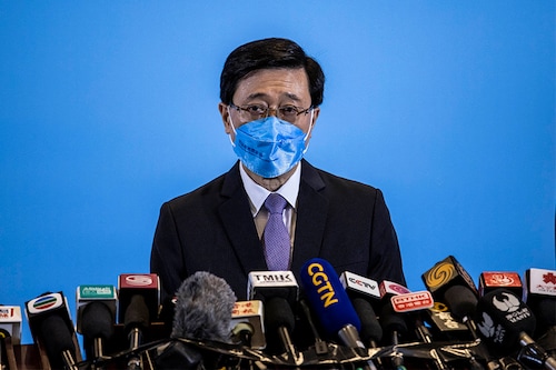 Hong Kong"s next leader John Lee is inheriting a once vibrant Asian business hub mired in its third year of pandemic isolation but he may prioritise security over an economic reboot, business leaders and observers say. (Credits: ISAAC LAWRENCE / AFP)