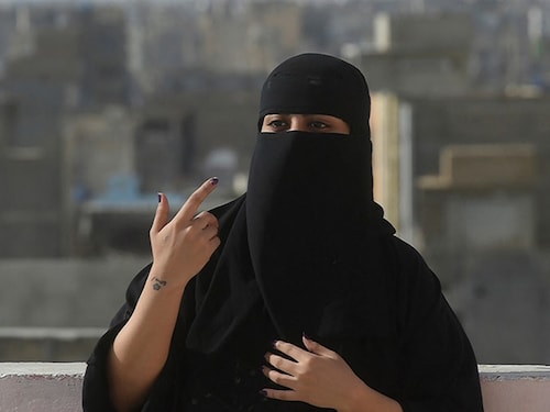 Girls and women at a home during the Eid al-Fitr holiday, in Kabul, Afghanistan, May 2, 2022. The ruling Taliban recently decreed that Afghan women must cover themselves from head to toe, and many girls have not been to school in months. Image: Kiana Hayeri/The New York Times Girls and women at a home during the Eid al-Fitr holiday, in Kabul, Afghanistan, May 2, 2022. The ruling Taliban recently decreed that Afghan women must cover themselves from head to toe, and many girls have not been to school in months. Image: Kiana Hayeri/The New York Times