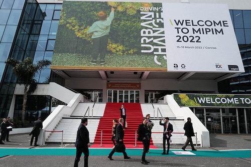 People visit the MIPIM international real estate show for professionals at the Palais des Festivals in Cannes, southeastern France on March 15, 2022. Image: Valery Hache/AFP People visit the MIPIM international real estate show for professionals at the Palais des Festivals in Cannes, southeastern France on March 15, 2022. Image: Valery Hache/AFP