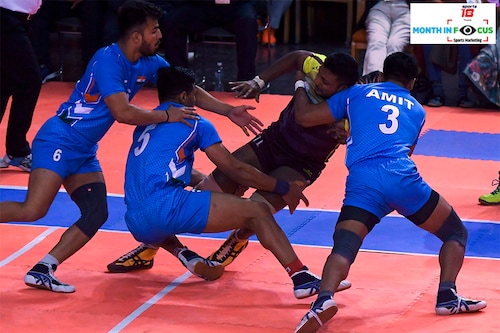 India"s players tussle with Sri Lanka"s Y.D. Sanjaya (C) during the Kabaddi final at the 13th South Asian Games (SAG) in Kathmandu on December 9, 2019. Image: PRAKASH MATHEMA/AFP via Getty Images