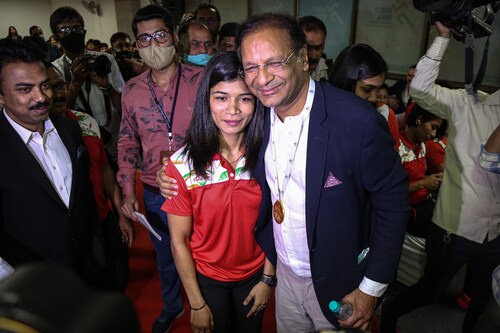 IBA Women"s World Boxing Championship gold medalist Nikhat Zareen with Spicejet"s chairman and President of Indian Boxing federation Ajay Singh during a felicitation ceremony, at Indira Gandhi Stadium, on May 24, 2022, in New Delhi, India. The Sports Authority of India (SAI) and Boxing Federation of India (BFI) felicitated gold medalist Zareen and bronze medal-winning boxers Manisha Moun and Parveen Hooda.