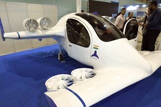 A 200 kilo, all electric two-seater flying taxi is the cynosure of all eyes at Bharat Drone Mahotsav, the biggest Indian drones festival at Pragati Maidan, New Delhi, on May 27, 2022. Hosted in partnership with the Ministry of Civil Aviation, the festival will host discussions on the world"s drone policies, advancement of drone technology, operations, and traffic management in the drone ecosystem and the future of the drone industry.