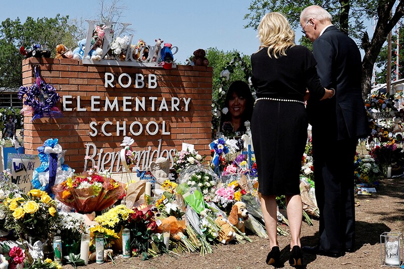 US President Joe Biden and first lady Jill Biden pay their respects at the Robb Elementary School memorial in Uvalde, Texas, where a gunman killed 19 children and two teachers in the deadliest US school shooting in nearly a decade. May 29, 2022.