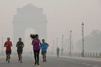 Joggers at India Gate on a smog-engulfed morning on November 1, 2022, in New Delhi, India. The toxic air quality in Delhi plunged into the "severe" category on Tuesday as the overall Air Quality Index (AQI) of the city touched 424, caused by pollutants from local sources and farm fires in neighbouring states, as per data released by Centre"s air-quality monitoring body SAFAR.