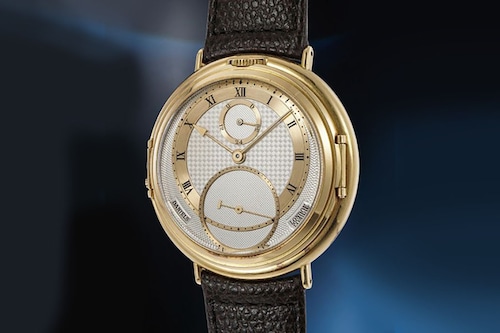 George Daniels  A unique, historically important double sided yellow gold wristwatch with power reserve, day and date
Image: Courtesy of Phillips Auctions