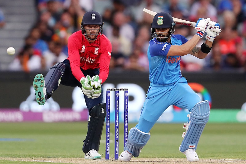 Virat Kohli of India and Jos Buttler of England during the ICC Men"s T20 World Cup Semi-Final match between India and England at Adelaide Oval on November 10, 2022 in Adelaide, Australia. Virat Kohli scored first half-century of the match.