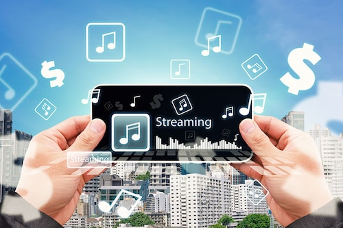 The rise of platforms like Spotify, Apple Music, and Deezer has fomented a heated debate on how content providers get paid for their work.
Image: Shutterstock The rise of platforms like Spotify, Apple Music, and Deezer has fomented a heated debate on how content providers get paid for their work.
Image: Shutterstock