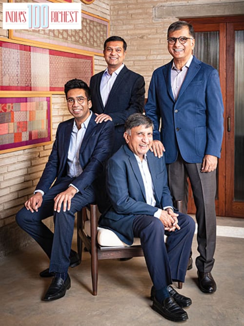 (Clockwise from front) Sudhir Mehta (seated), chairman emeritus, Torrent Group (pharmaceuticals &amp power), Aman Mehta, director, Torrent Pharmaceuticals, Varun Mehta, director, Torrent Power, and Samir Mehta, chairman, Torrent Power &amp Torrent Pharmaceuticals
Image: Mexy Xavier