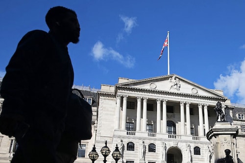 A Union flag flies over The Bank of England in central London on September 29, 2022. Fitch on Wednesday lowered the outlook for its credit rating for British government debt from stable to negative after new Prime Minister Liz Truss announced a crash program of debt-fueled tax cuts. Image: ISABEL INFANTES / AFP A Union flag flies over The Bank of England in central London on September 29, 2022. Fitch on Wednesday lowered the outlook for its credit rating for British government debt from stable to negative after new Prime Minister Liz Truss announced a crash program of debt-fueled tax cuts. Image: ISABEL INFANTES / AFP