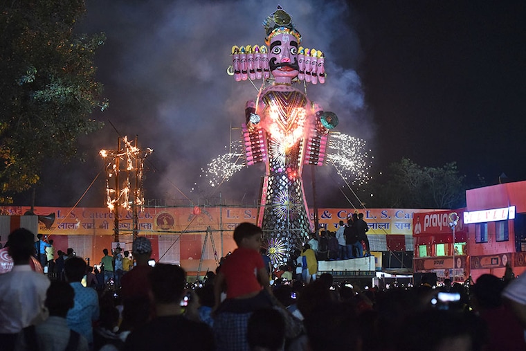 Effigies of Ravan along with Kumbhkaran and Meghanad burning during the Dussehra festival celebrated by Shri Dharmic Leela Committee Madhav Das Park, Red Fort Ground on October 5, 2022 in New Delhi, India.