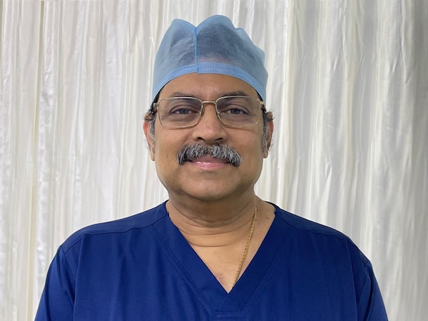 Eclo"s Co-funder Quentin Declerck holds a crate of mushrooms produced by the company Eclo. Image: Kenzo TRIBOUILLARD / AFPÂ©
