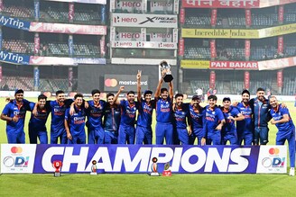 India"s players pose with the trophy after winning the one-day series at the end of the third and final one-day international (ODI) cricket match between India and South Africa at the Arun Jaitley Stadium in New Delhi on October 11, 2022.