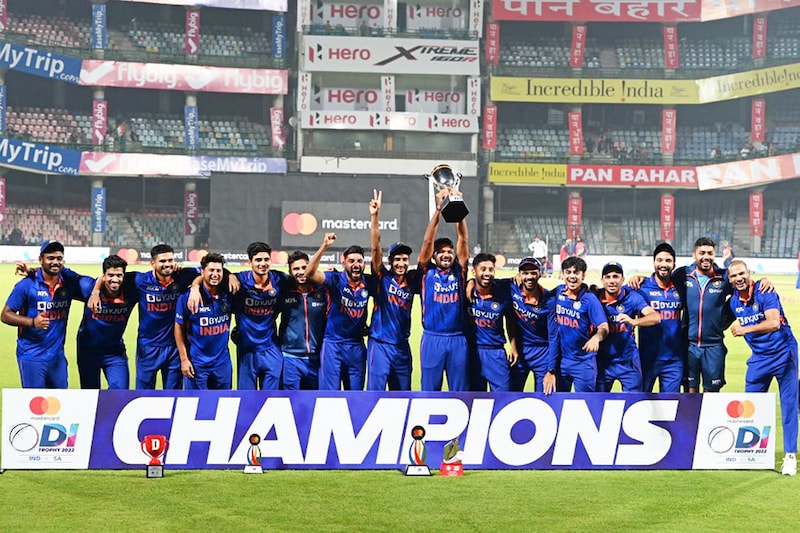 India"s players pose with the trophy after winning the one-day series at the end of the third and final one-day international (ODI) cricket match between India and South Africa at the Arun Jaitley Stadium in New Delhi on October 11, 2022.