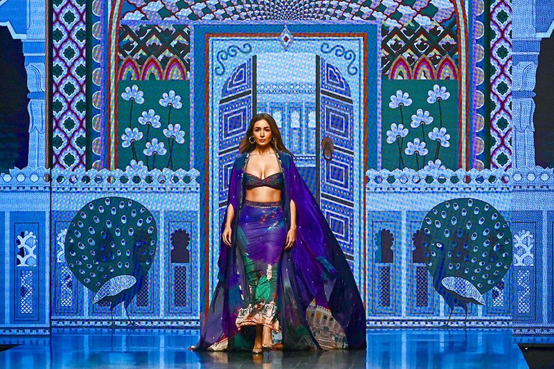 Bollywood actress Malaika Arora presents a creation by designer Limerick during the FDCI X Lakme Fashion Week in Mumbai on October 14, 2022.