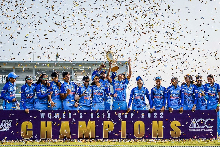 India’s cricketers celebrate their victory at the end of the women"s Asia Cup final cricket match between India and Sri Lanka at Sylhet International Stadium in Bangladesh on October 15, 2022. India maintained their dominance with an eight-wicket demolition of Sri Lanka, to romp to their seventh Asia Cup title. Image: Tanvin Tamin / AFP