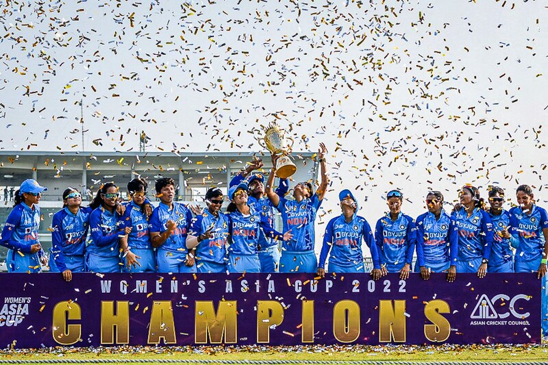 India’s cricketers celebrate their victory at the end of the women"s Asia Cup final cricket match between India and Sri Lanka at Sylhet International Stadium in Bangladesh on October 15, 2022. India maintained their dominance with an eight-wicket demolition of Sri Lanka, to romp to their seventh Asia Cup title. Image: Tanvin Tamin / AFP