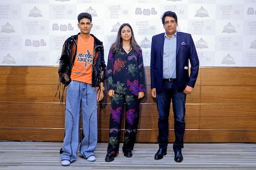 (From Left) Cricketer and showstopper Shubman Gill, designer Kanika Goyal and Arvinder Singh, chief operating officer, Gujarat Titans (From Left) Cricketer and showstopper Shubman Gill, designer Kanika Goyal and Arvinder Singh, chief operating officer, Gujarat Titans