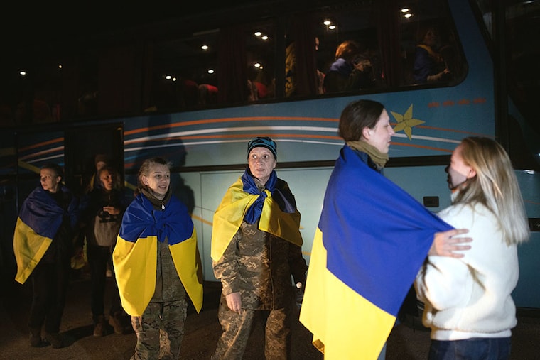Women covered in Ukrainian flags were seen during an all-female prisoner swap with Russia since the war began in Ukraine on October 17, 2022.