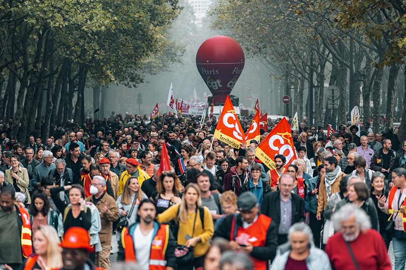 Several thousand demonstrators marched during a demonstration in Paris on October 18, 2022, after the CGT and FO unions called for a nationwide strike for higher wages and against the government"s requisitioning of some strikers at refineries to return to work. In support, unions in other industries and the public sector called for strike action and denounced soaring energy prices and overall inflation in the cost of living.