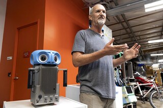 Steven Silverman, senior technical program manager and manager of Imagery Solutions for Google, talks about the newest Google Street View Camera device that will be launched in 2023 at the Google Street View Garage in Mountain View, California. Image: Brittany Hosea-Small / AFP
