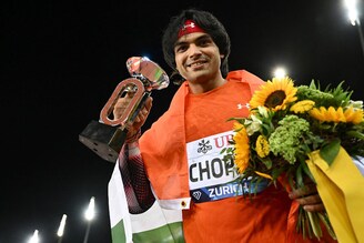 India"s Neeraj Chopra celebrates his victory in the men"s javelin final at the Diamond League athletics meet at Stadion Letzigrund stadium in Zurich on September 8, 2022. The 24-year-old Olympic gold winner created history by winning this prestigious competition, a diamond trophy, $30,000 prize money, and a wild card entry for the 2023 World Athletics Championships in Budapest, Hungary.