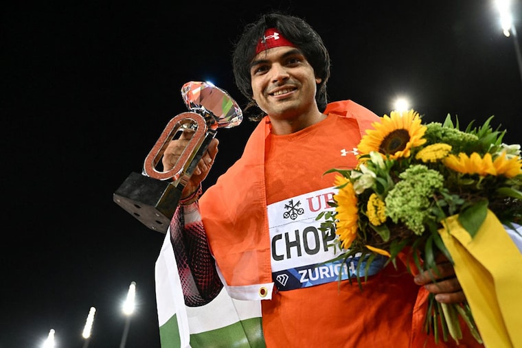India"s Neeraj Chopra celebrates his victory in the men"s javelin final at the Diamond League athletics meet at Stadion Letzigrund stadium in Zurich on September 8, 2022. The 24-year-old Olympic gold winner created history by winning this prestigious competition, a diamond trophy, $30,000 prize money, and a wild card entry for the 2023 World Athletics Championships in Budapest, Hungary.