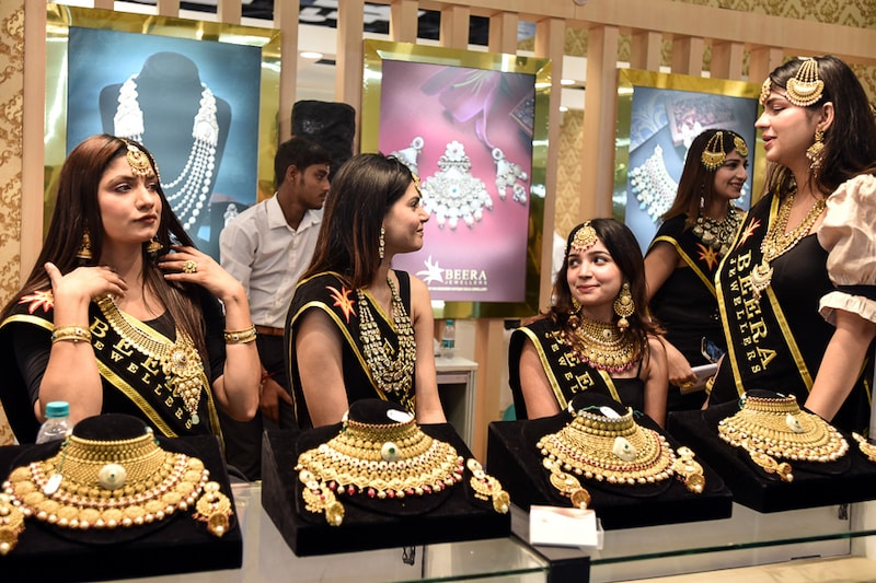 Models display jewellery at the The Delhi Jewellery & Gem Fair (DJGF) at Pragati Maidan, on September 10, 2022 in New Delhi, India. The 10th edition of North India"s biggest International jewellery trade show provides a platform for sellers to connect, exchange ideas, discover upcoming trends and generate business opportunities with buyers all across the country.