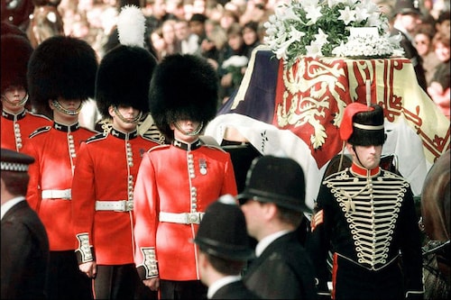 (File) The coffin of Diana, Princess of Wales, laid on a gun carriage and flanked by the bearer of Welsh Guardsman is lead to Westminster Abbey 06 September. (ELECTRONIC IMAGE)
Image: Thomas Coex / AFP (File) The coffin of Diana, Princess of Wales, laid on a gun carriage and flanked by the bearer of Welsh Guardsman is lead to Westminster Abbey 06 September. (ELECTRONIC IMAGE)
Image: Thomas Coex / AFP