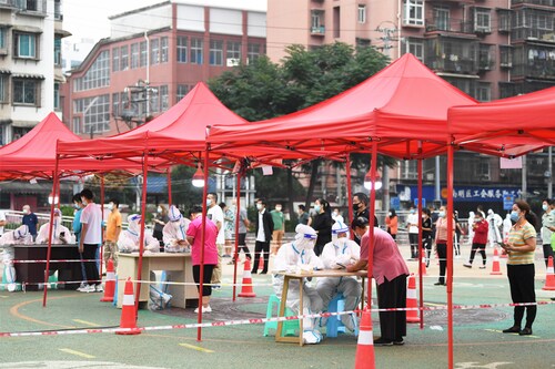 Medical staff take nucleic acid samples for residents at a nucleic acid sampling site in Nanming district, Guiyang, China, Sept 9, 2022.&nbspImage: CFOTO/Future Publishing via Getty Images
