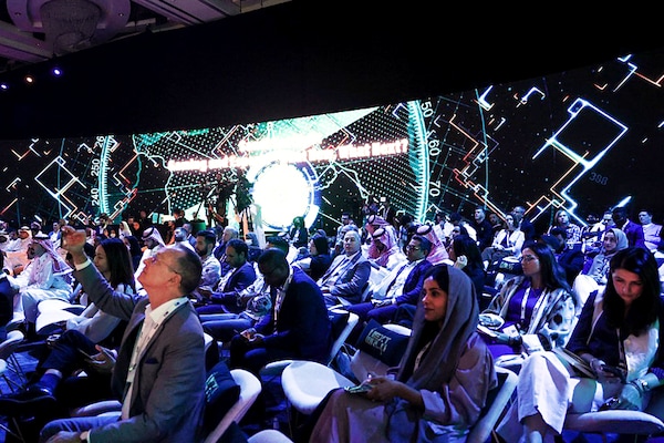 People attend the International E-Sport Gamers forum "Next World", in the Saudi capital Riyadh, on September 7, 2022. Much like with Formula One and professional golf, Saudi Arabia, the world"s biggest oil exporter has in recent years leveraged its immense wealth to assert itself on the eSports stage, hosting glitzy conferences and snapping up established tournament organisers. Image:&nbspFayez Nureldine / AFP