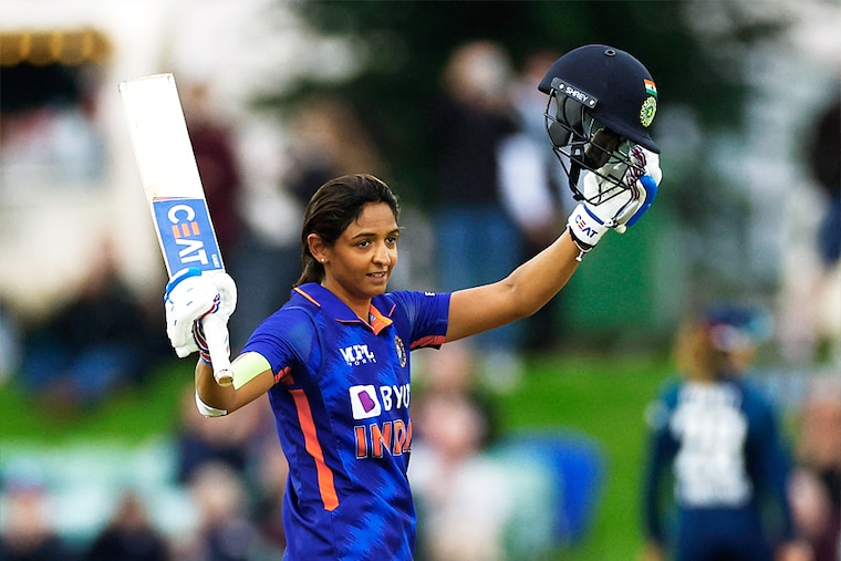 India"s skipper Harmanpreet Kaur celebrates her century in the second Women"s One Day International Series against England at The Spitfire Ground St Lawrence, Canterbury, Britain on September 21, 2022. Kaur smashed 18 fours and 4 sixes in her 111-ball unbeaten knock of 143 to help India amass their highest-ever overseas total of 333 and win the match.